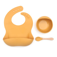 baby feeding set with bib, suction bowl and baby spoon in yellow